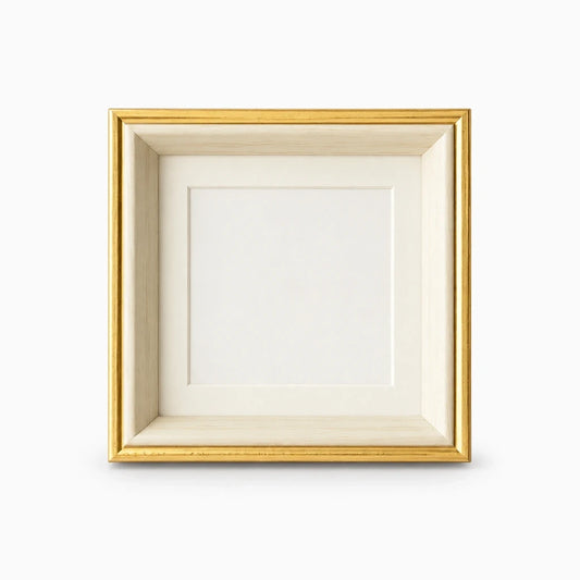 Cadre pour photo carré avec ouverture ronde de 10 cm, finition dorée sur bureau