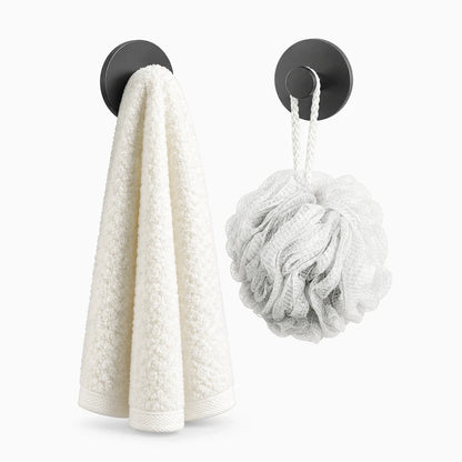 Crochet mural à coller en deux coloris disponibles dans une entrée