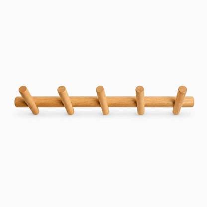 Porte manteau mural compact en bois pour organiser les affaires de l'enfant dans le couloir